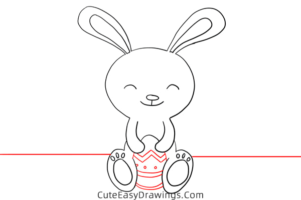 how to draw an easter bunny with an egg - www.cuteeasydrawings.com